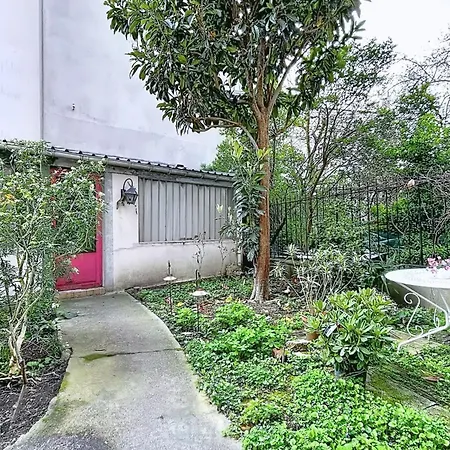 With Garden In The Heart Of Montmartre